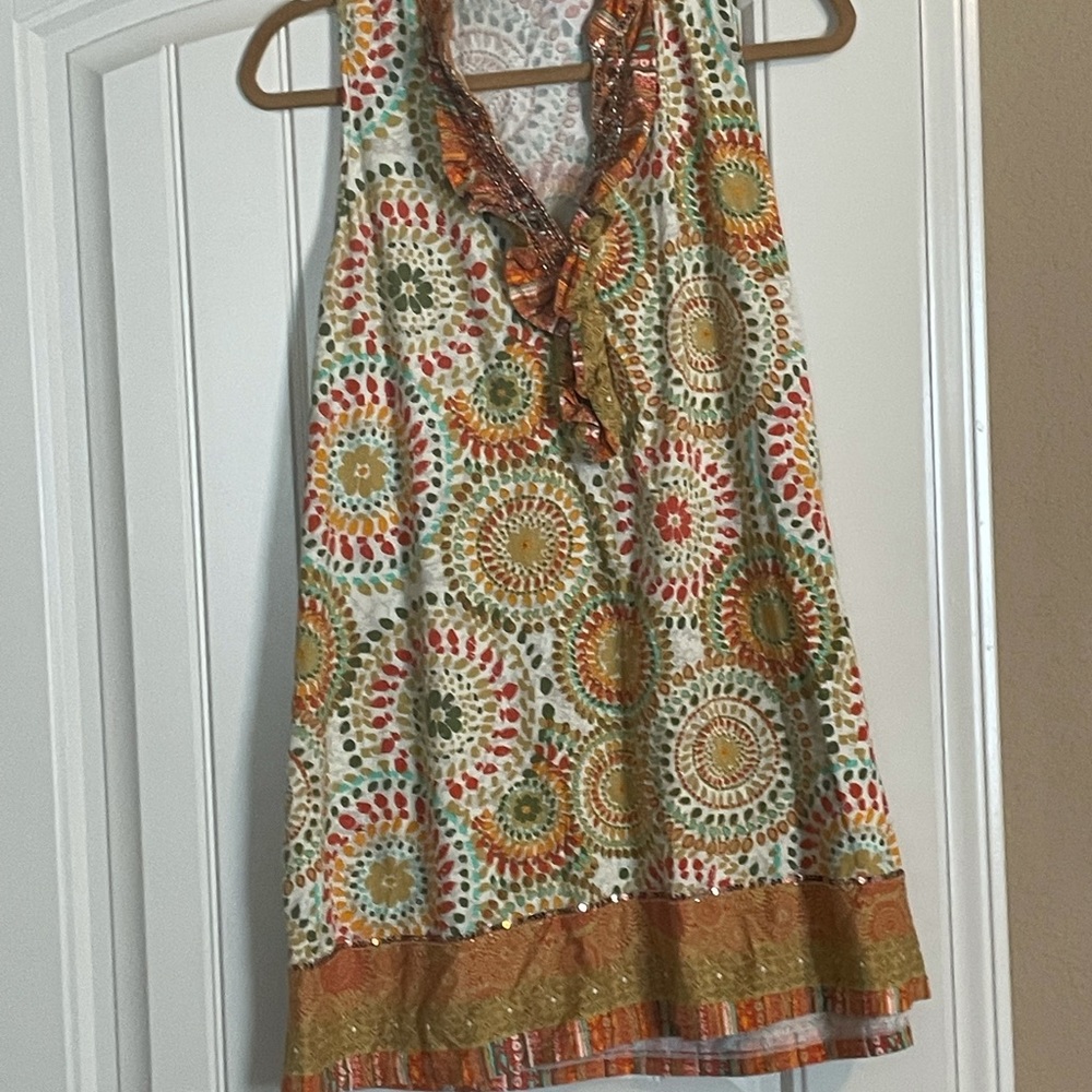 Sleeveless tunic with sequin accents